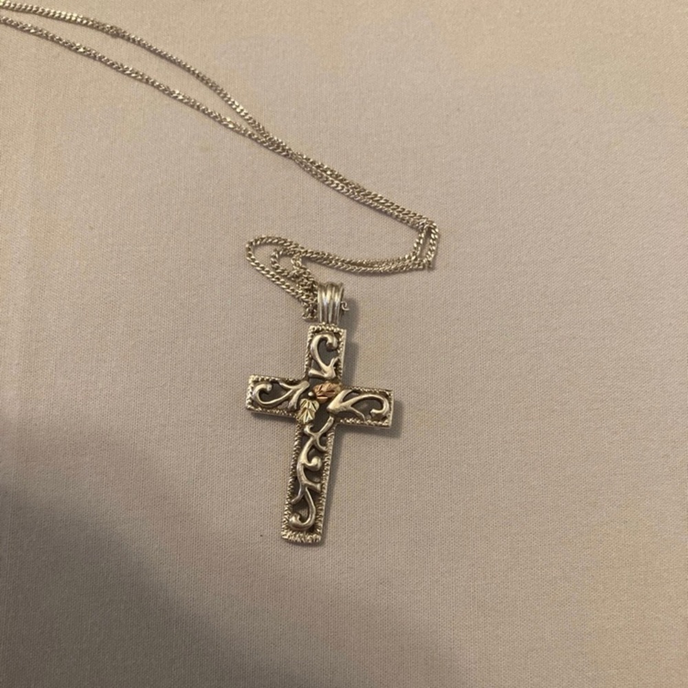 Woman’s vintage 12kt gold + sterling silver black hills gold cross pendant!